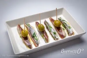 Tapa de boquerones con anchoas, matrimonio.