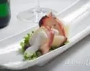 Brocheta de pulpo y melón con aceite cítrico